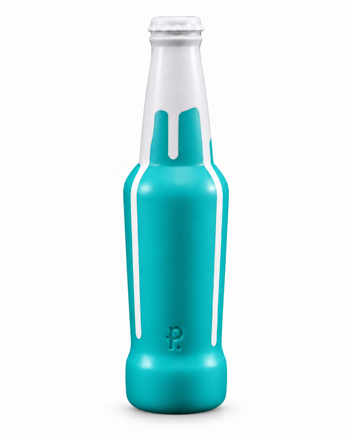 Turquoise silicone beer bottle toy with white drips and a moulded Phreak logo, standing upright on white with a soft shadow.