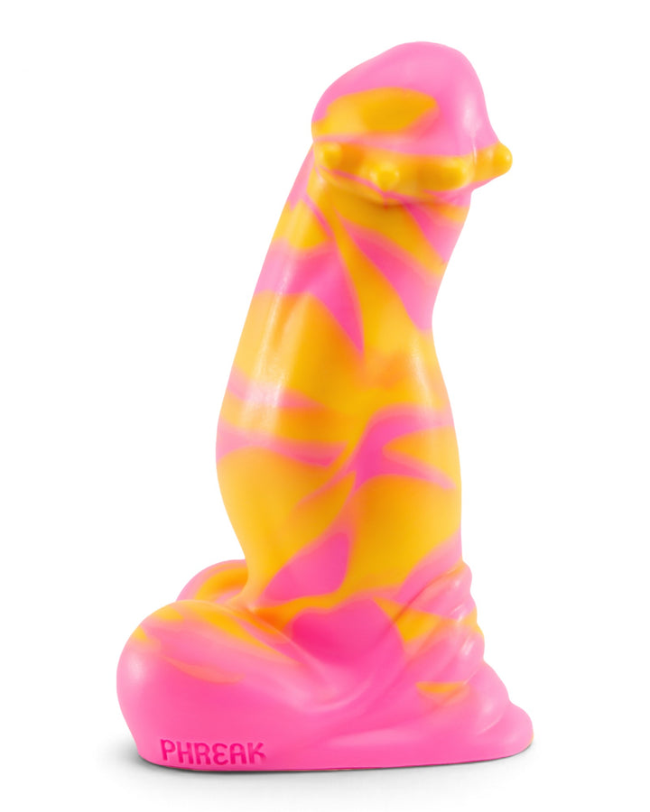 Side view of a pink and mango-yellow Phreak silicone toy, showing its curved profile and broad sculpted base.