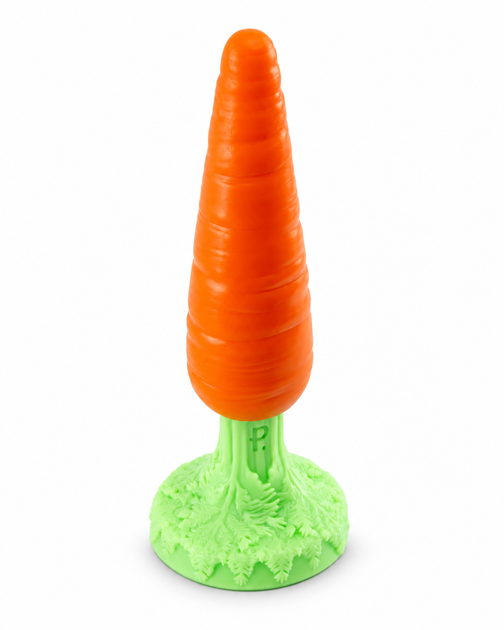 Alternate view of Phreak’s Carrot silicone toy showing its tapered orange shape, embossed logo and sculpted green leaf base on white.