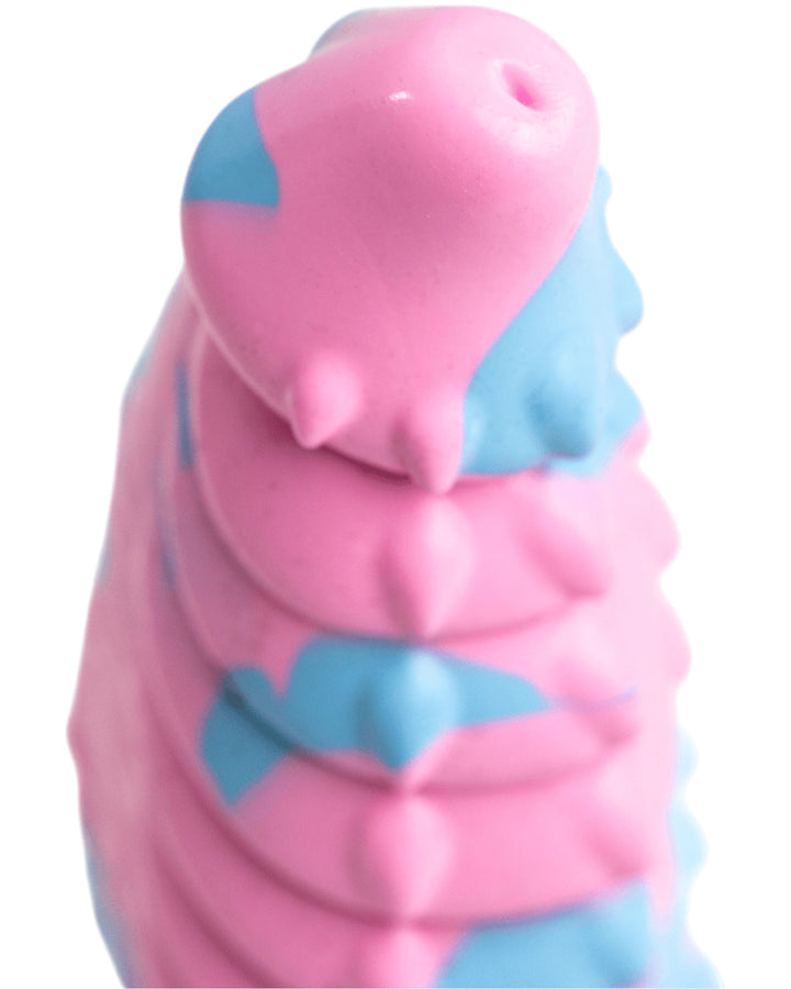 Close-up of Dovah’s pink and blue tip, showing its rounded shape and small raised points beneath the edge.