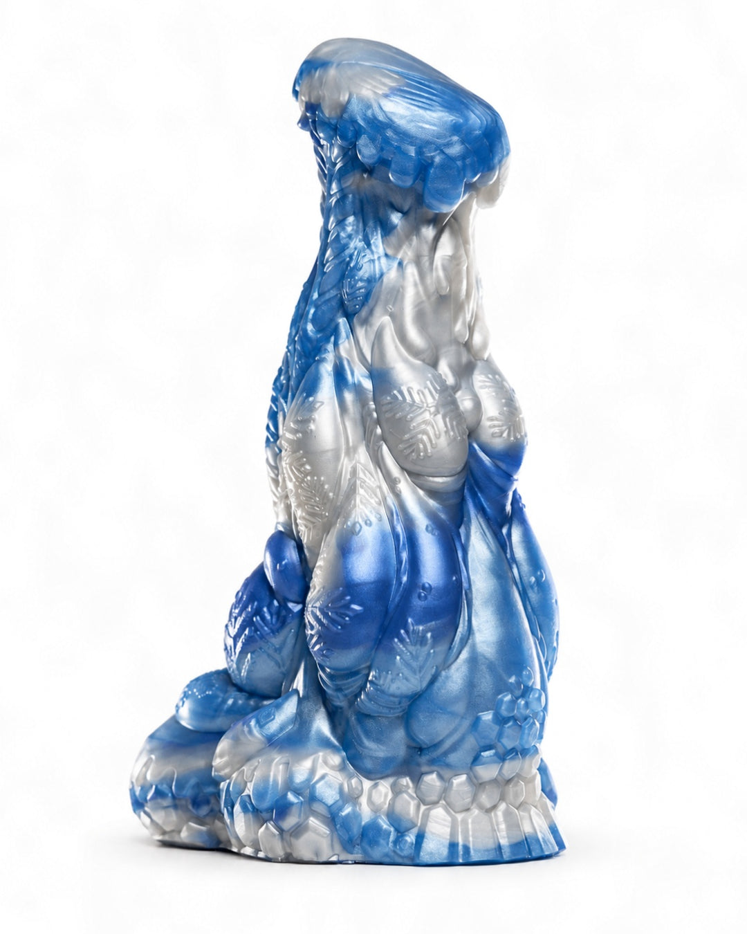 Three-quarter view of Everest in metallic blue and silver silicone, showing snowflake details and a sculpted icy base.