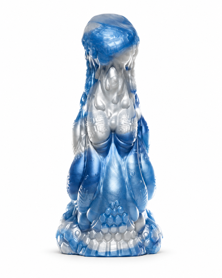 Front view of Everest showing blue and silver marbling, layered textures and a wide, rounded base.