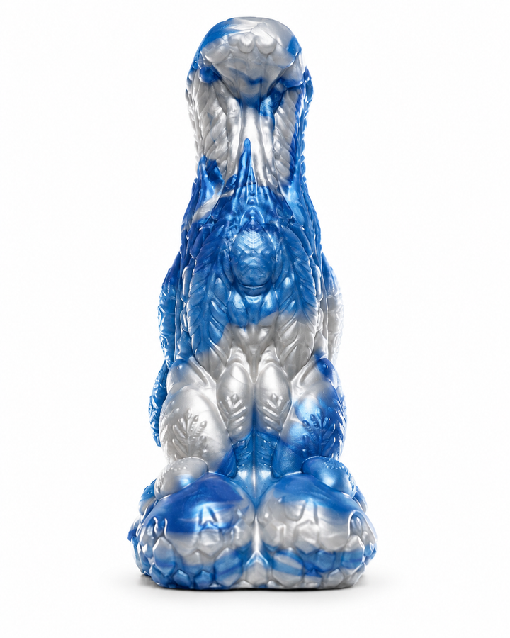 Rear view of Everest showing flowing sculpted ridges and snowflake motifs in metallic blue and silver.