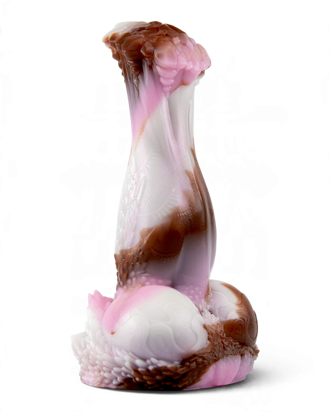Three-quarter view of Frostmane in white, pink and chocolate-brown silicone, showing celestial details and a sculpted base.