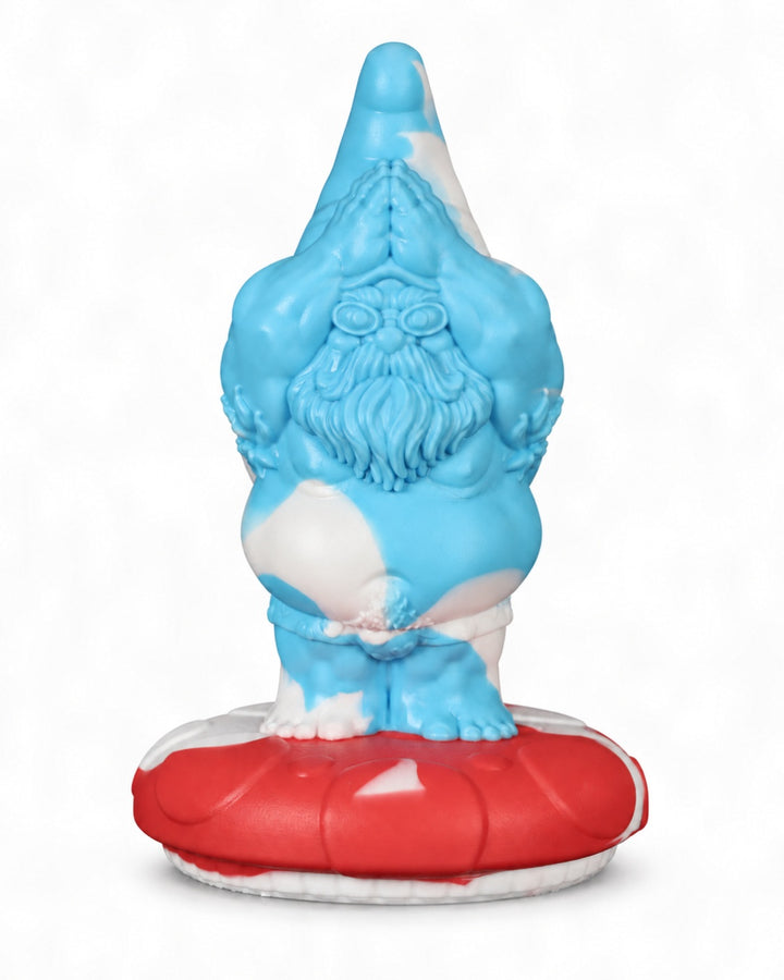 Front view of the blue and white marbled Gnomey-Oh silicone toy on a red and white mushroom base, against a white background.
