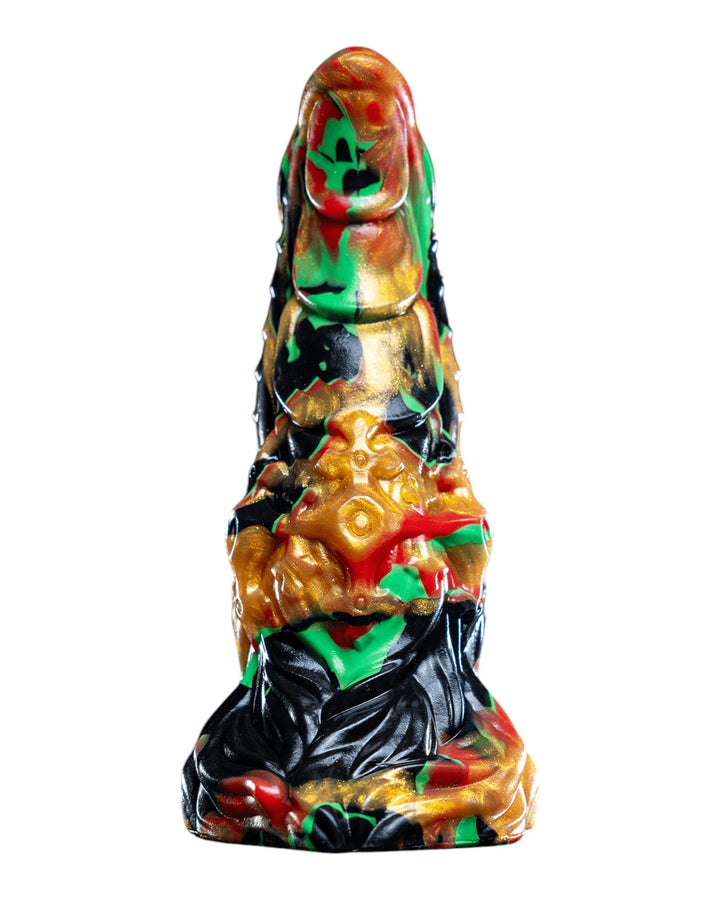 Rear view of Krampus showing segmented ridges and flowing base details in black, green, red and metallic gold.