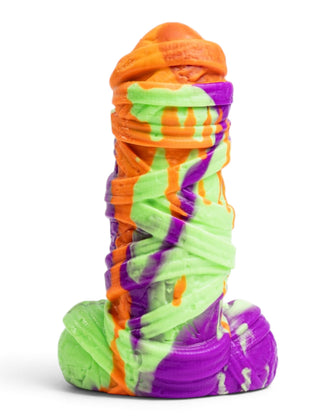Rear view of Phreak’s Mummy silicone toy with overlapping bandages and orange, pale green and purple colouring.