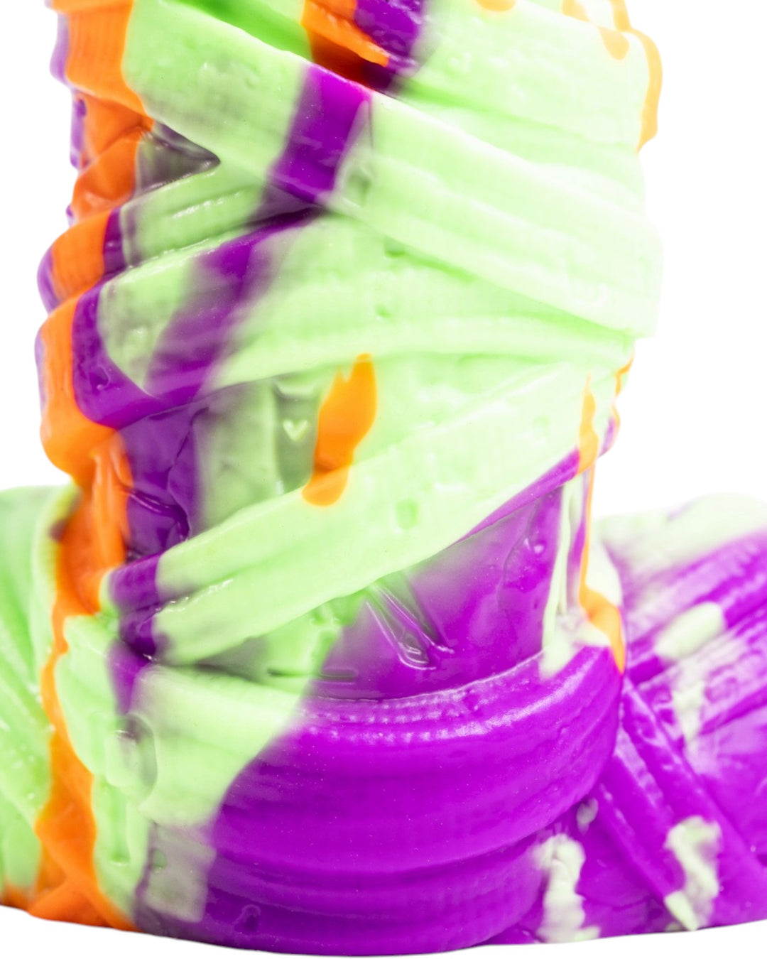 Close-up of purple and pale green bandages and recessed detailing on Phreak’s Mummy silicone toy.