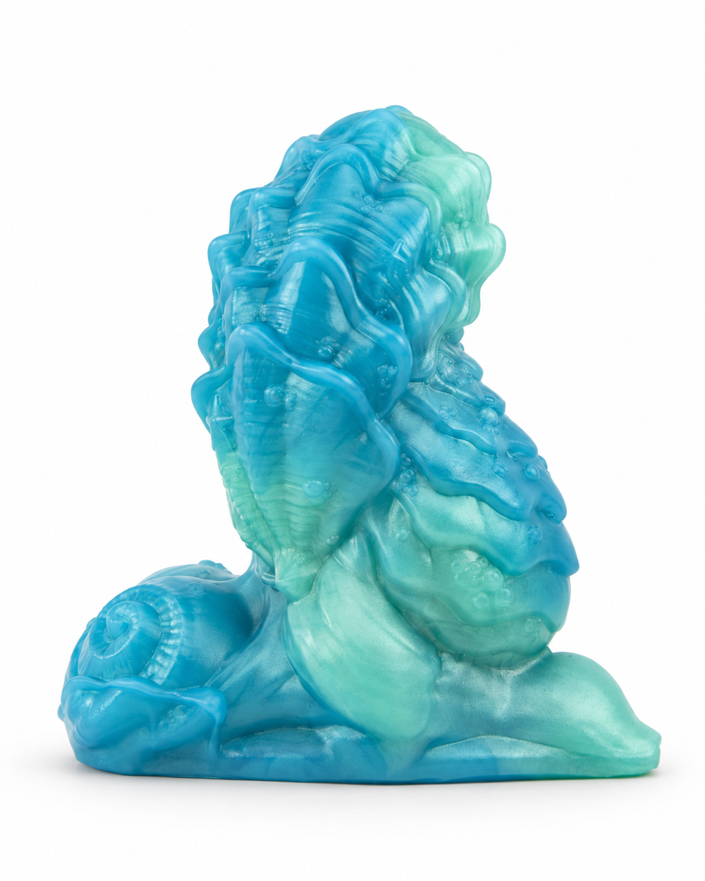 Blue and mint silicone fantasy toy with raised winding ridges, shell-like textures and a sculpted spiral base, on white with a soft shadow.