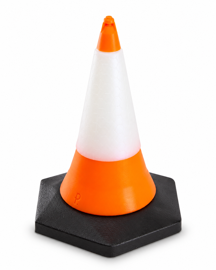 Angled view of Phreak’s silicone Traffic Cone toy, showing its orange body, wide white band and black square base on white.