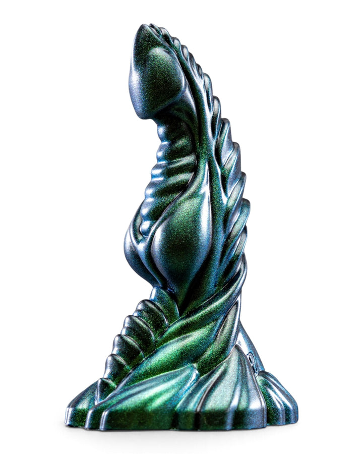 Side view of a metallic teal and green Phreak silicone toy with sweeping sculpted ridges and a flared base.