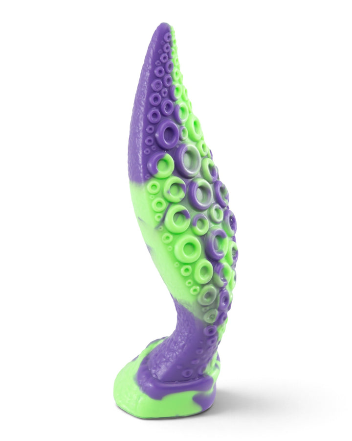 Angled view of a purple and lime-green silicone tentacle toy showing rows of sculpted suckers and a curved profile.